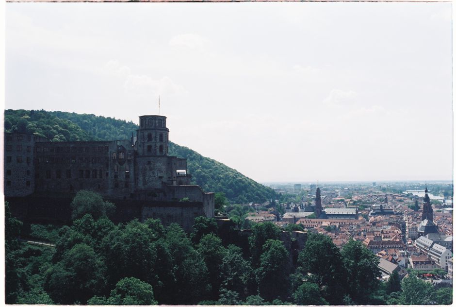 A stunning view of Heidelberg Castle with the old town of Heidelberg, Germany in the background.